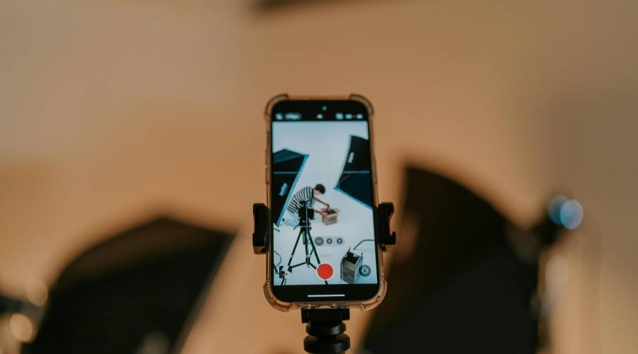 Phone recording studio setup with photographer